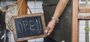 Open Written On Chalk Sign Outside Store